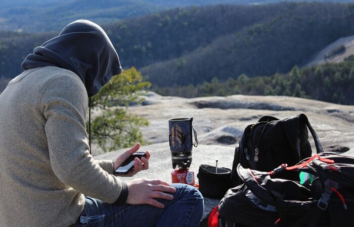 Are camping stoves safe to use and what are the different options?