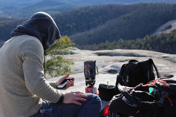 Are camping stoves safe to use and what are the different options?