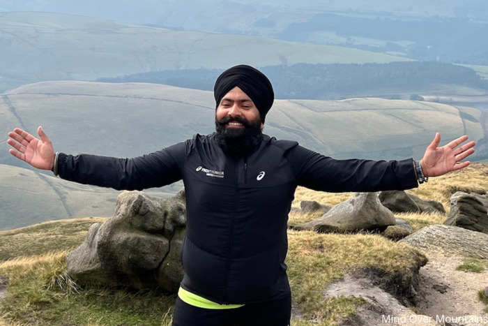 A hiker on a group walk with Mind Over Mountain charity