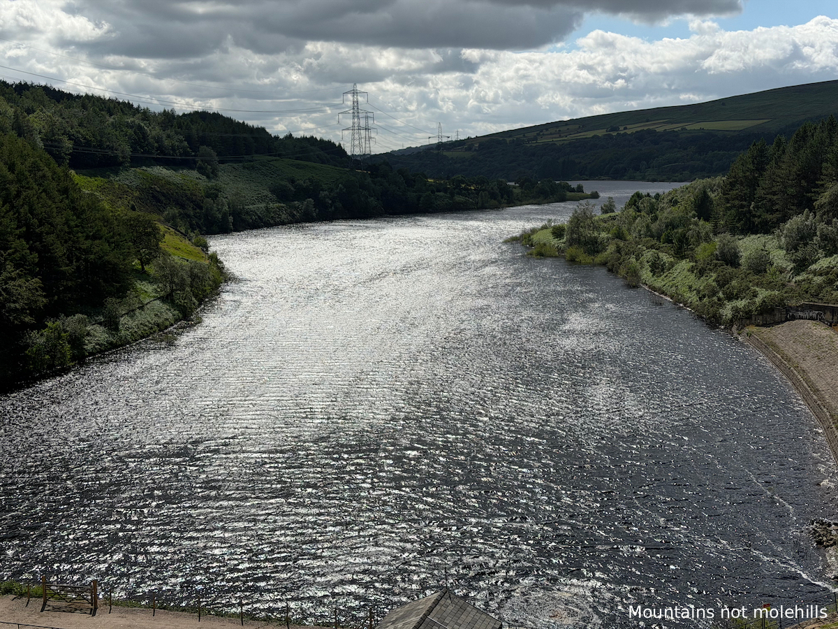 A view of Rhodeswood reservoir from the road crossing over it